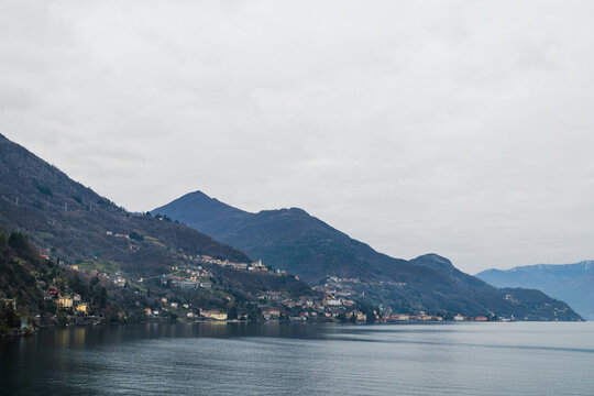 Mountain range with a village, lake Como, Italy