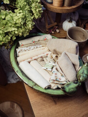 Fabrics Collection in Ceramic Tray and Green Hydrangeas