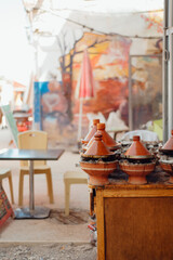 Traditional Moroccan Tagine Pots in a Street Café in Taghazout