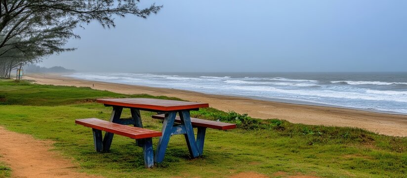 Digha Beach Scenic View with Park and Vibrant Picnic Table on the Shoreline