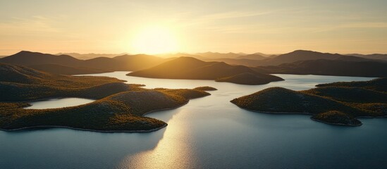 Fototapeta premium Sunset over Rogoznica coast aerial view showcasing serene waters and lush islands in the distance tranquil natural landscape background.
