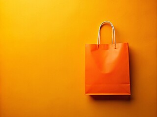 Bright Orange Shopping Bag on Vibrant Yellow Background with Ample Copy Space for Promotions, Ads, or Product Marketing, Ideal for Retail and Online Stores