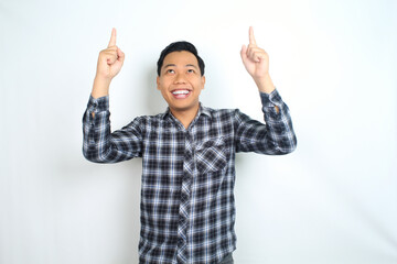 happy asian man pointing hand with smiling face and confident gesture isolated on white backgroun wearing plaid shirt