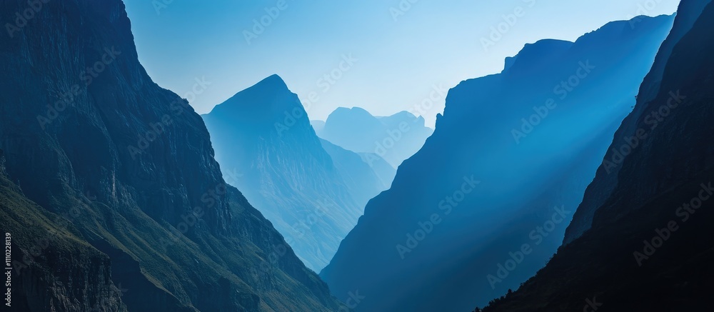 Poster silhouette of mountains against a dark blue sky with soft light creating a dramatic atmosphere in a 