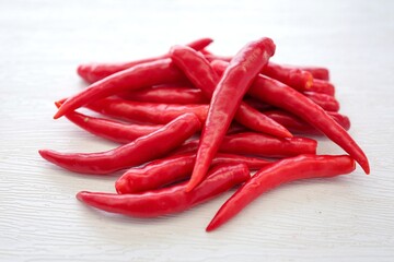Red chili,spur chilli, spur chili pepper, spur pepper, long  red pepper on white background