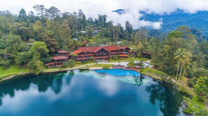 Obraz premium Tranquil Resort by Mountain Lake with Lush Surroundings