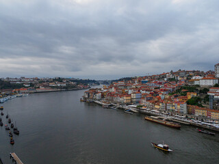 Large evening panoramic view of the bay of Porto and the Don Luis I Bridge, Portugal.