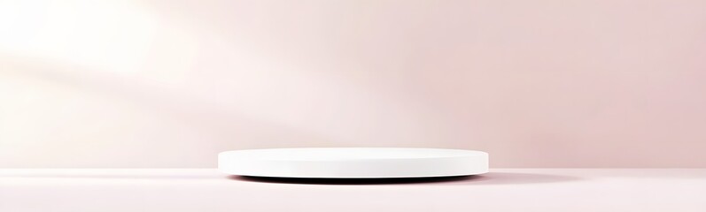 Minimalist white podium with a smooth surface, placed against a soft pastel pink background, leaving plenty of space for product display.