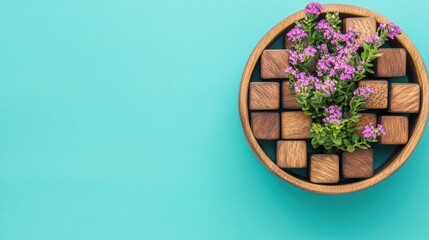 ERP business concept with wooden cubes and a potted flower on a vibrant green background symbolizing growth and innovation in business.