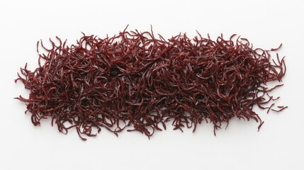 Fototapeta premium Grated red beetroots arranged neatly on a white background showcasing their vibrant color and texture for culinary inspiration