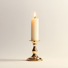 A lit candle on a decorative stand, creating a warm and inviting atmosphere.