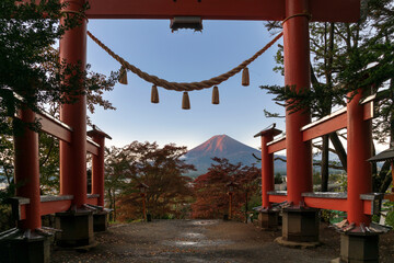 View of Mount Fuji through the torii gate of the Arakura Fuji Sengen Shinto Shrine on a sunny...