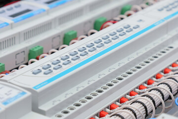 A relay module for managing loads over the data bus. Close-up. Soft focus.
