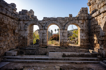 Rows of columns in Perge, Antalya, Turkey. Remains of colonnaded street in Pamphylian ancient city.Rows of columns in Perge, Antalya, Turkey. Ancient Kestros Fountain. Aksu, Antalya