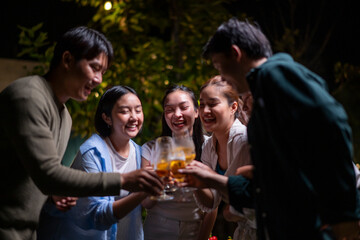 A group of people are standing around and drinking wine