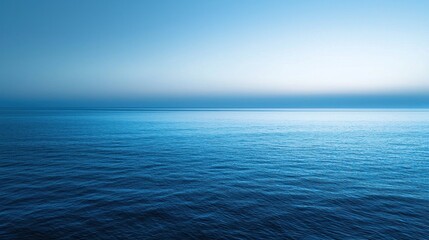 A smooth gradient of blue shades blending from dark navy to light sky blue, creating a calm and serene atmosphere.