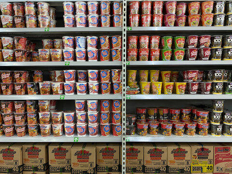 Semarang, Indonesia - November 11th 2023: Various instant noodle brands at Indonesia, displayed on supermarket shelf