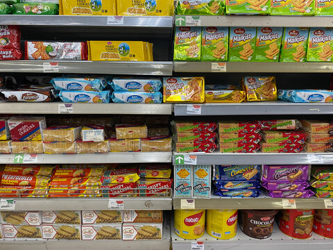 Semarang, Indonesia - November 11th 2023: Various sweet snacks brands at Indonesia, displayed on supermarket shelf