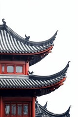 Red building, curved roof, grey tiles, ornate details.