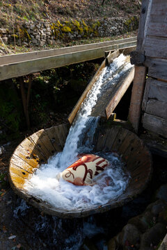 Traditional water mill in Maramures showcasing rural craftsmanship