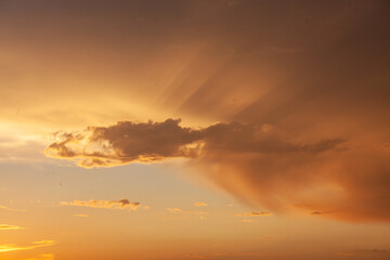 Twilight in Sviyazhsk unveils stunning clouds illuminated by the suns warm descent, creating a breathtaking display.