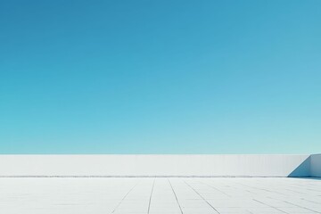 White rooftop, blue sky, minimalist scene.