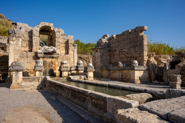 Rows of columns in Perge, Antalya, Turkey. Remains of colonnaded street in Pamphylian ancient city.Rows of columns in Perge, Antalya, Turkey. Ancient Kestros Fountain. Aksu, Antalya