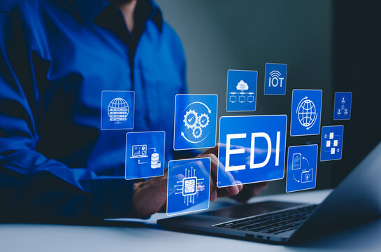 EDI, Electronic Data Interchange Concept. Businessman working on EDI (Electronic Data Interchange) icons, global data transfer, digital security, information paperwork exchange in business context,