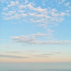 Fototapeta premium Serene seascape at dawn, pastel sky, calm ocean.