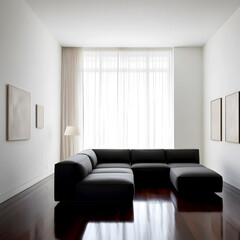 Obraz premium Elegant and airy modern living room interior with a sleek, low-profile, charcoal grey sectional sofa placed against a crisp white wall