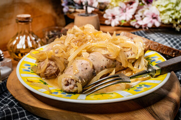 White sausage with stewed onion.