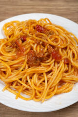 angle view spaghetti with classic bolognese sauce at vertical composition