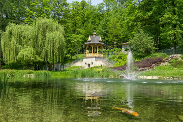 Fountain in Szczawnica city park during summer in Pieniny, Poland