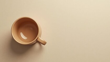 Beige coffee cup on a light beige background, minimalist design with copy space
