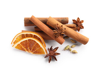 Different aromatic spices isolated on white, top view. Christmas season