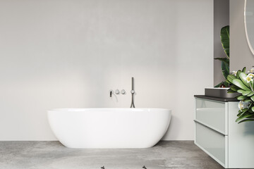 Minimalist bathroom showcasing a freestanding bathtub and sleek fixtures, with a focus on simplicity and modern design.