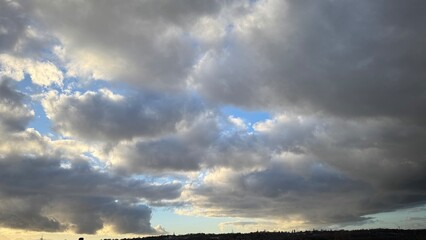 Gray and Blue Stratus Clouds Over City Skyline