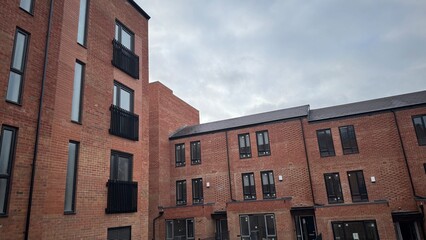 Red Brick Apartment Building and Attached Townhouses