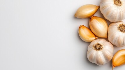 A photostock of fresh garlic bulbs and cloves, isolated on a clean white background, natural and flavorful. High Quality