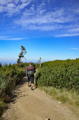 two tourists on the trail from Korbielów to Pilsko in the Beskid Mountains