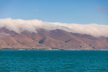 View of the biggest lake in Armenia, Sevan Lake. Mountain around.