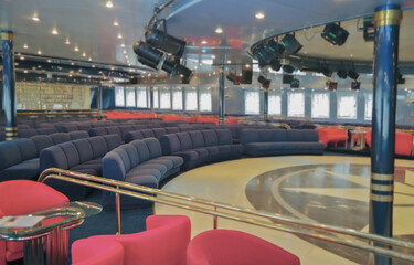 Bar lounge or club onboard classic historic cruiseship cruise ship liner in dated ambience and...