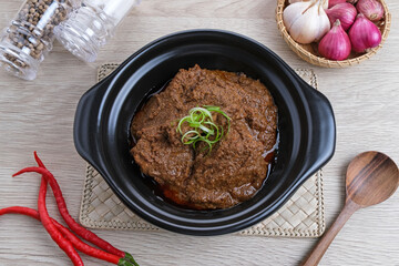 Rendang Daging Sapi, traditional food from Padang, Indonesia. Beef stew with spices, herbs and coconut milk

