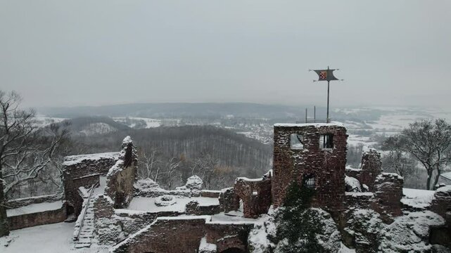 Aerial view ruins of old castle. Winter. Ruin of Hohnstein Castle, Harz mountains, Germany.