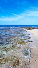 Rockiest part with crystal clear water of Platja de Son Bou a village in the Alaior region.    