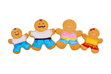 Top view of a family of gingerbread men isolated. Ginger cookies. Food concept. Family day.