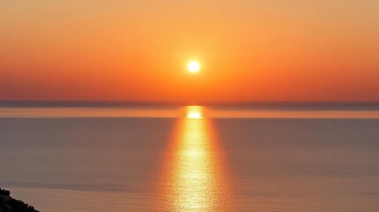 Obraz premium Travel image showing the orange sky of the sunset over the sea