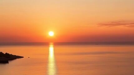 Obraz premium Travel image showing the orange sky of the sunset over the sea