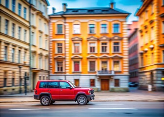 Obraz premium A Dynamic Tilt-Shift Perspective of a Red SUV Driving Through Riga Streets with Motion Blur Capturing the Essence of Urban Mobility on a March Day