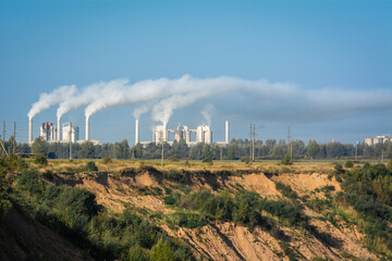 Air pollution smoke from pipes and factory .